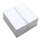 Stack of folded white organic cotton towels with textured pattern