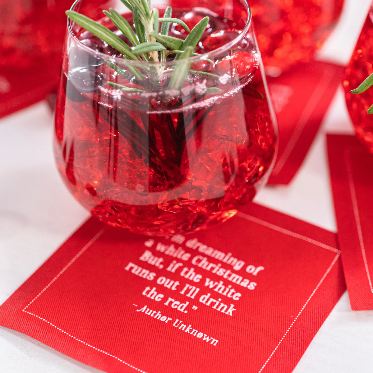 Red cocktail on luxury cotton napkin with festive quote, Five Star Napkins holiday table decor