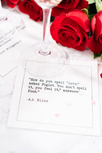 Organic cotton cocktail napkin with A.A. Milne quote, wine glass, red roses, party setting