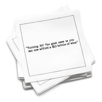 Stack of white 30th birthday quote cocktail napkins with black typewriter-style text reading, “Turning 30? The good news is you can now afford a $10 bottle of wine.”