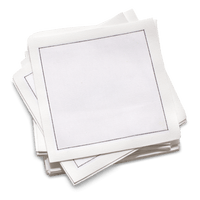 Stack of luxury white organic cotton cocktail napkins with stitched border