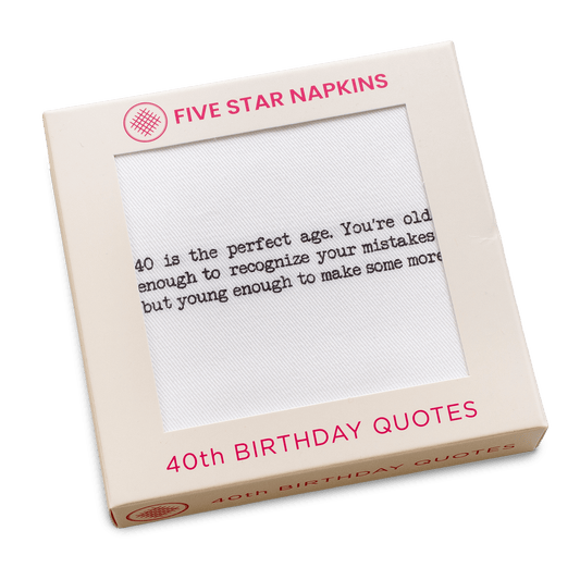 Kraft gift box from Five Star Napkins' 40th Birthday Quotes collection, showing an organic cotton cocktail napkin printed with the quote "40 is the perfect age. You're old enough to recognize your mistakes but young enough to make some more"