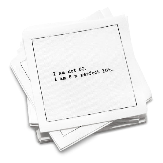 Organic cotton cocktail napkin with black dotted border printed with the quote "I am not 60. I am 6 x perfect 10's," from Five Star Napkins' 60th birthday quote collection
