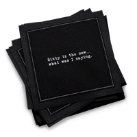 Organic cotton cocktail napkin, black, with white dotted border printed with the quote "Sixty is the new... what was I saying," from Five Star Napkins' 60th birthday quote collection
