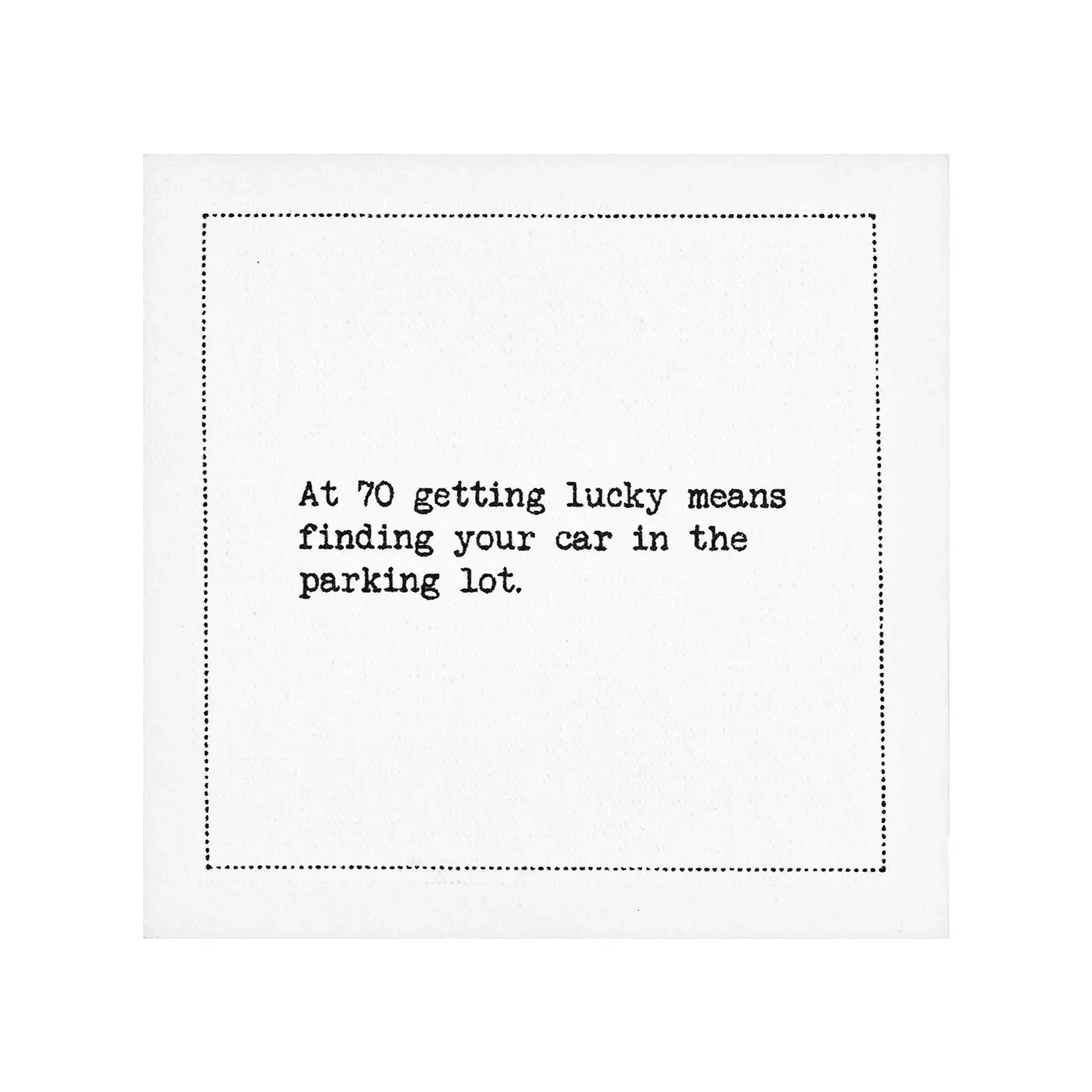 Organic cotton napkin with printed quote: At 70 getting lucky means finding your car in the parking lot.