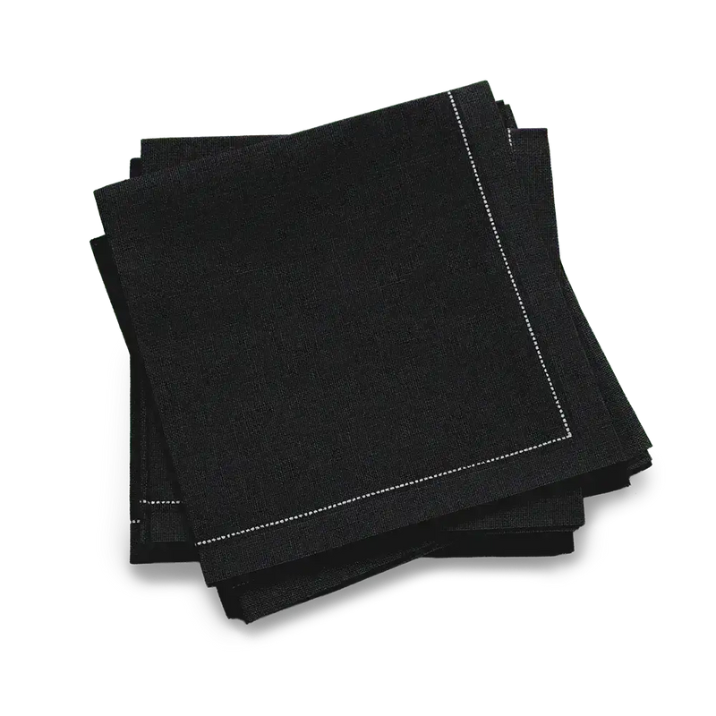 Black organic cotton cocktail napkins with white stitched border, luxury tableware