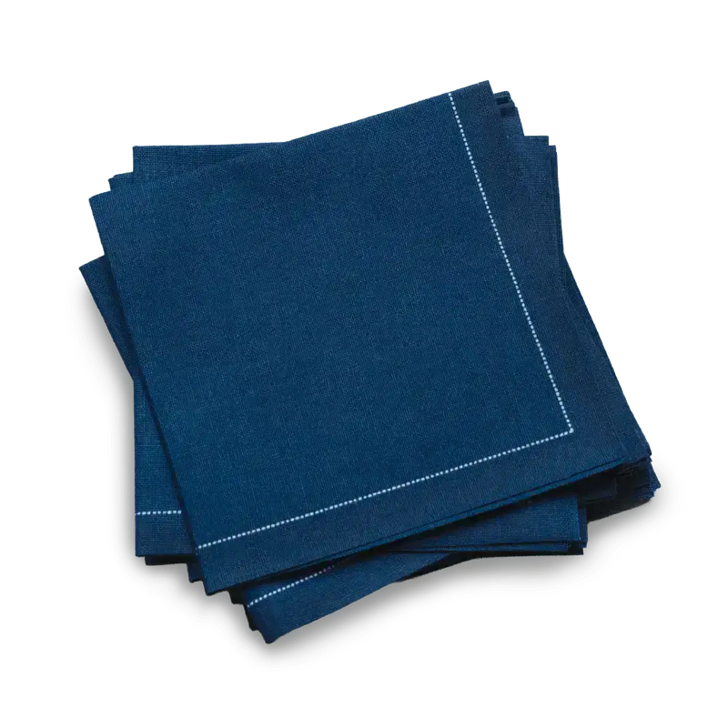 Midnight blue organic cotton cocktail napkins with white stitched border from Five Star Napkins