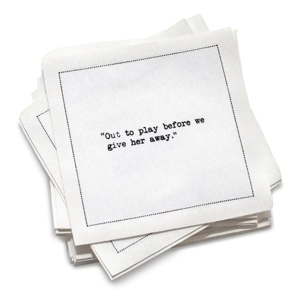 Stack of white cotton cocktail napkins with black bachelorette quotes on a white background
