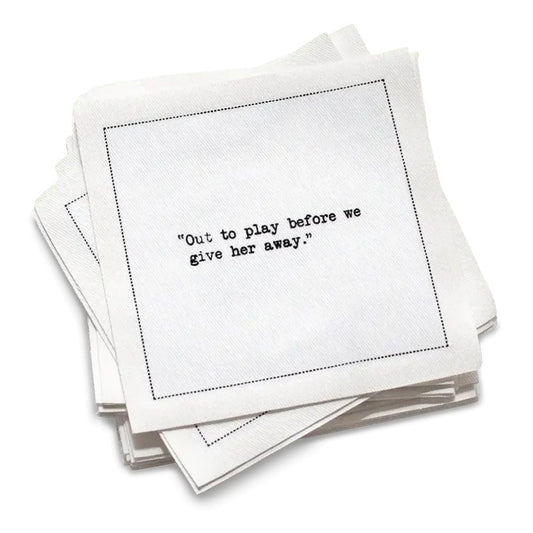 Stack of white cotton cocktail napkins with black bachelorette quotes on a white background