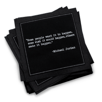 Black organic cotton cocktail napkins with a white inspirational quote from Michael Jordan.