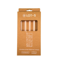Four-pack of transparent reusable glass smoothie straws in cardboard box packaging