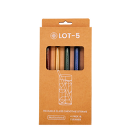 Pack of four multicolored reusable glass smoothie straws with cleaner, visible through box window.
