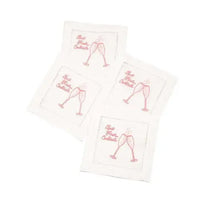 Set of four organic cotton cocktail napkins with pink glasses and 'but first, cocktails' quote