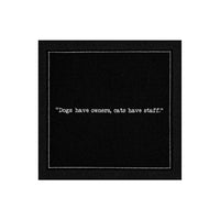 Anthracite Grey organic cotton napkin with printed quote 'Dogs have owners, cats have staff.'