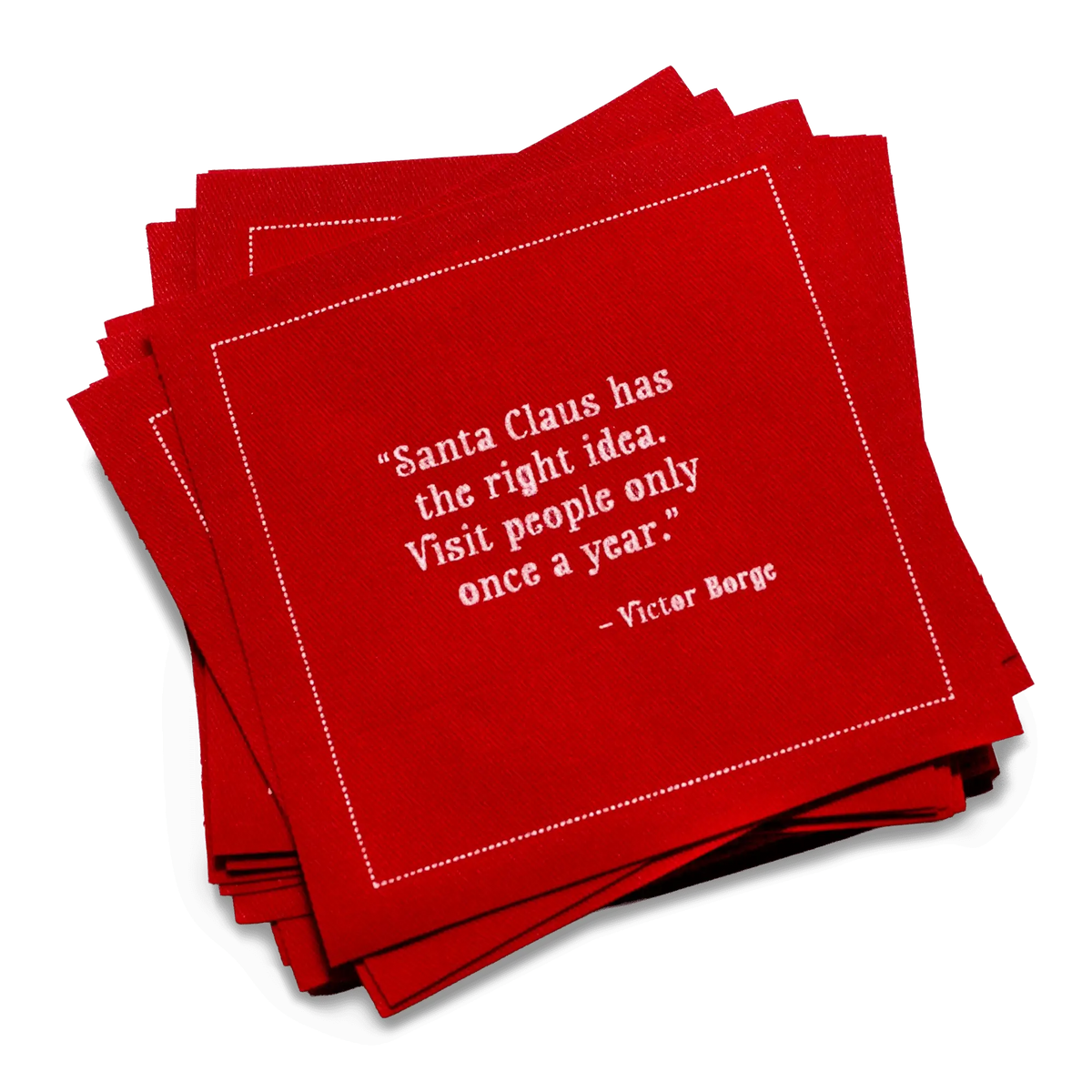 Stack of red organic cotton cocktail napkins printed with the quote, “I’m dreaming of a white Christmas. But, if the white runs out I’ll drink the red.” – Author Unknown.