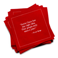 Stack of red organic cotton cocktail napkins printed with the quote, “I’m dreaming of a white Christmas. But, if the white runs out I’ll drink the red.” – Author Unknown.