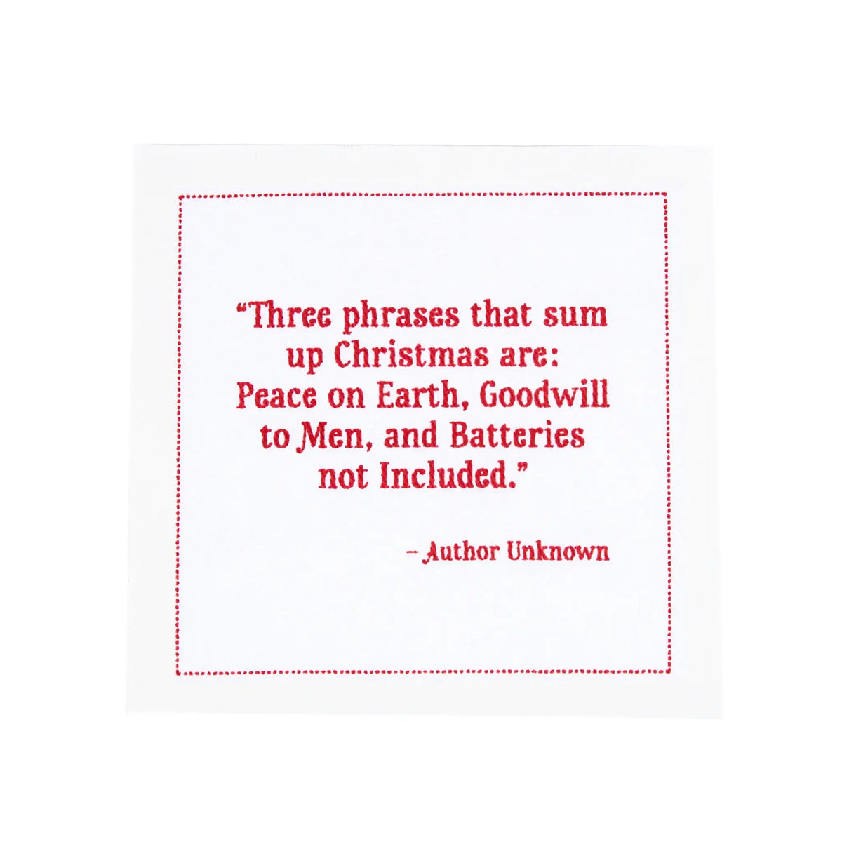 organic cotton napkin with red quote text: 'Three phrases that sum up Christmas are: Peace on Earth, Goodwill to Men, and Batteries not Included.'
