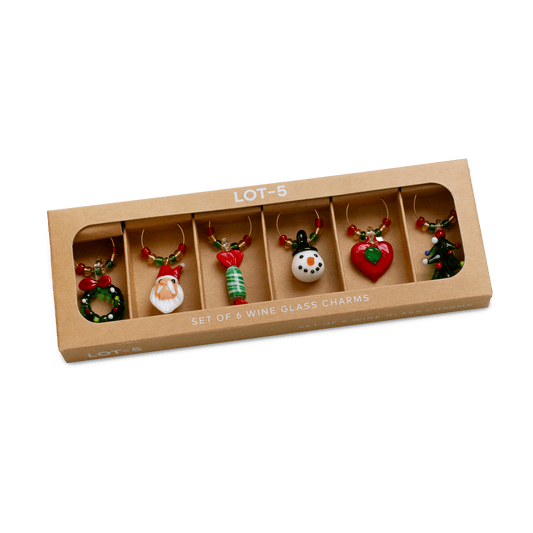 Boxed set of six Christmas-themed wine glass charms — wreath, Santa, candy cane, snowman, heart, and tree — by Five Star Napkins.