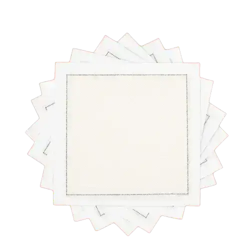 Fanned stack of ecru organic cotton cocktail napkins, by Five Star Napkins.
