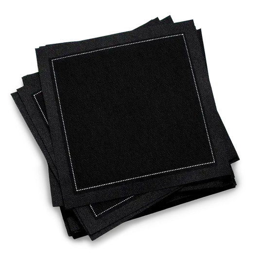 Black organic cotton cocktail napkins with white stitched border, luxury tableware set.