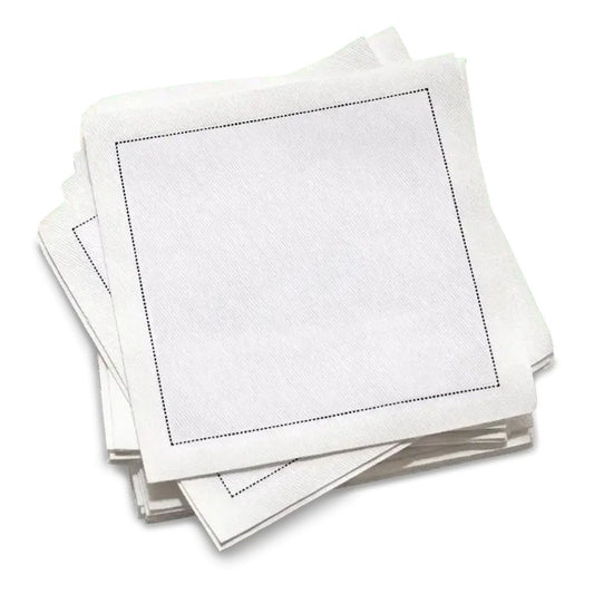 Stack of white organic cotton cocktail napkins with a stitched border, by Five Star Napkins.