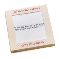 Gift box from Five Star Napkins' Coffee Quotes quote collection, showing an organic cotton cocktail napkin printed with the quote "A bad day with coffee is better than a good day without it"
