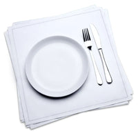 Stack of white organic cotton dinner napkins with a white plate, fork, and knife, by Five Star Napkins.