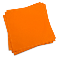 Stack of orange organic cotton dinner napkins from Five Star Napkins