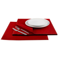 Luxury red cotton placemat and napkin set with white plates and silver cutlery