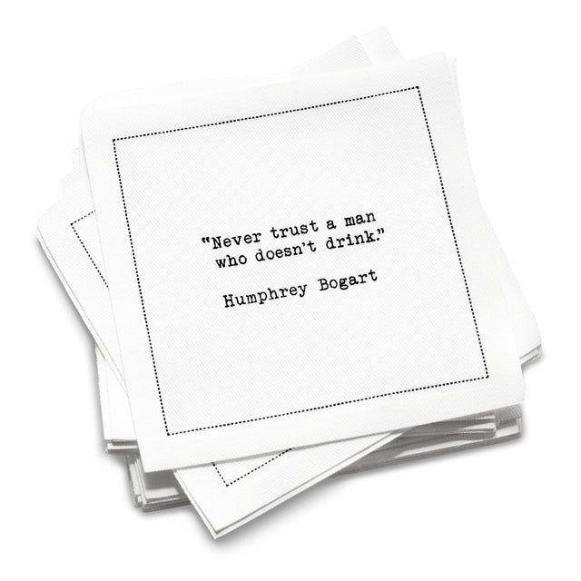 50 White Cotton Cocktail Napkins from The Drinking Quotes First Edition, featuring quotes by famous actors and authors in black typewriter-style text reading, “Never trust a man who doesn’t drink.” – Humphrey Bogart.