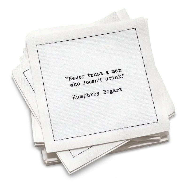 50 white Cotton Cocktail Napkins from The Drinking Quotes First Edition, featuring quotes by famous actors and authors in white typewriter-style text reading, “I love the nights I can’t remember with the friends I can’t forget.” – Unknown Author.