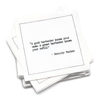 Organic cotton cocktail napkin, white, with black dotted border printed with the quote "A good bartender knows your name. A great bartender knows your refill," from Five Star Napkins' Drinking Quotes Third Edition collection