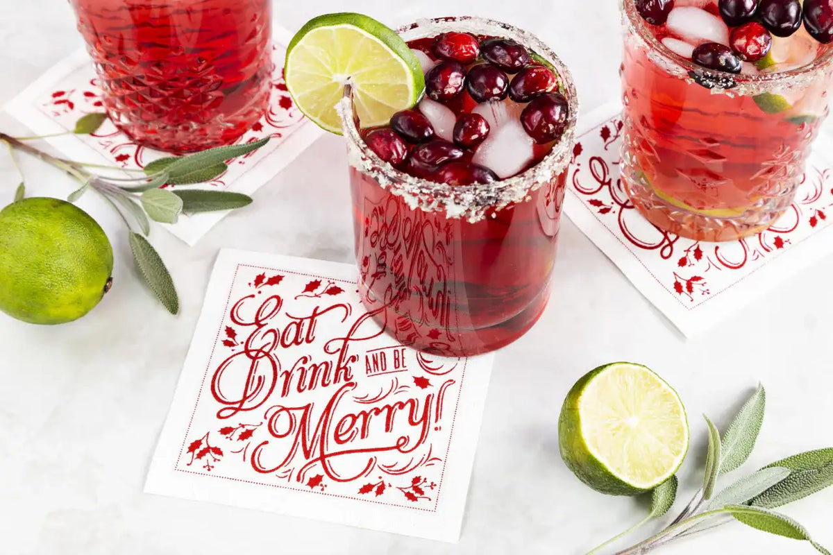 Organic cotton cocktail napkin with red 'Eat Drink and Be Merry!' quote, holiday drinks, limes