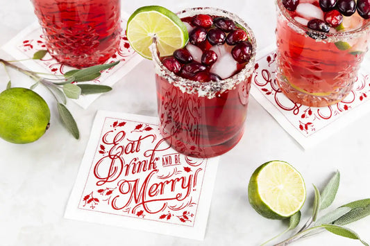 Organic cotton cocktail napkin with red 'Eat Drink and Be Merry!' quote, holiday drinks, limes