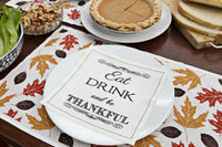 Organic cotton napkin with 'Eat Drink and be Thankful' quote on autumn leaf table setting