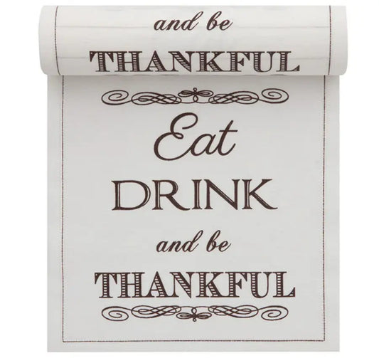 Organic cotton placemat with printed quote 'Eat Drink and be Thankful' in brown text