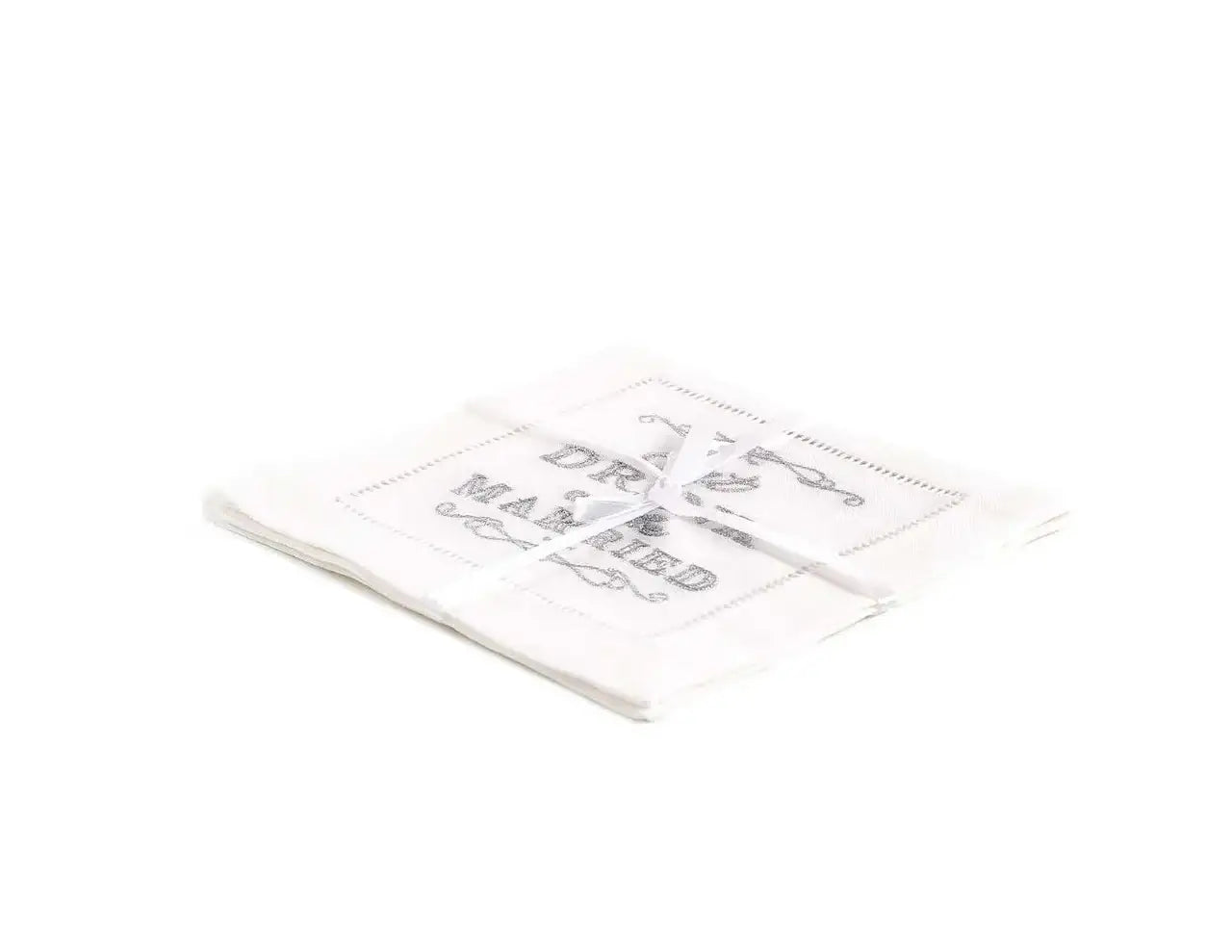 Pack of folded organic cotton napkins featuring the printed quote 'Eat Drink Married', tied with ribbon.