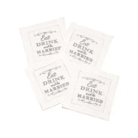 Set of white organic cotton napkins featuring the printed quote 'Eat, Drink and Be Married'.