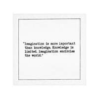 Organic cotton cocktail napkin with black dotted border printed with the quote "Imagination is more important than knowledge. Knowledge is limited. Imagination encircles the world," from Five Star Napkins' Einstein quote collection