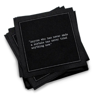 Organic cotton cocktail napkin, black, with white dotted border printed with the quote "Anyone who has never made a mistake has never tried anything new," from Five Star Napkins' Einstein quote collection