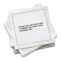 Organic cotton cocktail napkin, white, with black dotted border printed with the quote "Anyone who has never made a mistake has never tried anything new," from Five Star Napkins' Einstein quote collection