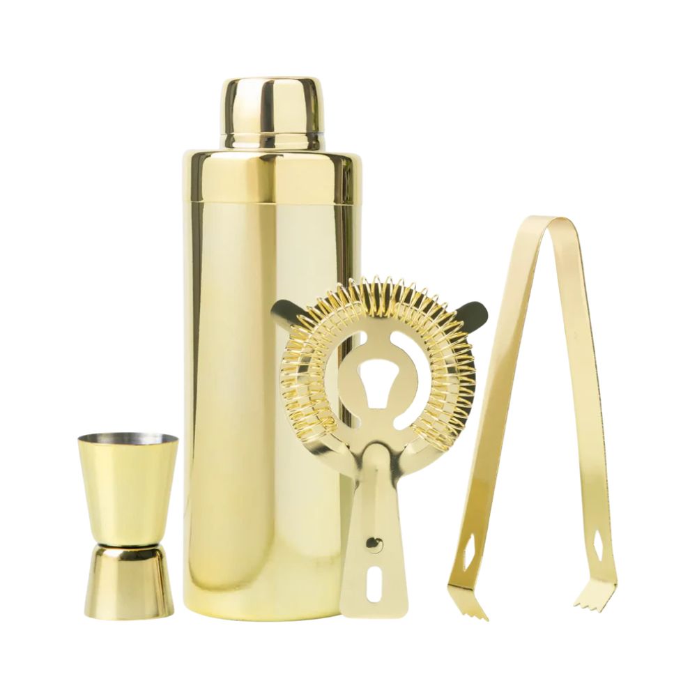 Gold stainless steel cocktail shaker set including a shaker, jigger, strainer, and ice tongs, by Five Star Napkins.