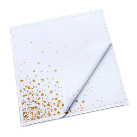 Folded white organic cotton dinner napkin with a gold star print, by Five Star Napkins.