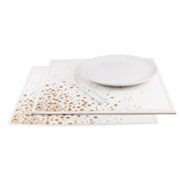 organic cotton placemats with Gold Stars pattern, styled with white plate and cutlery