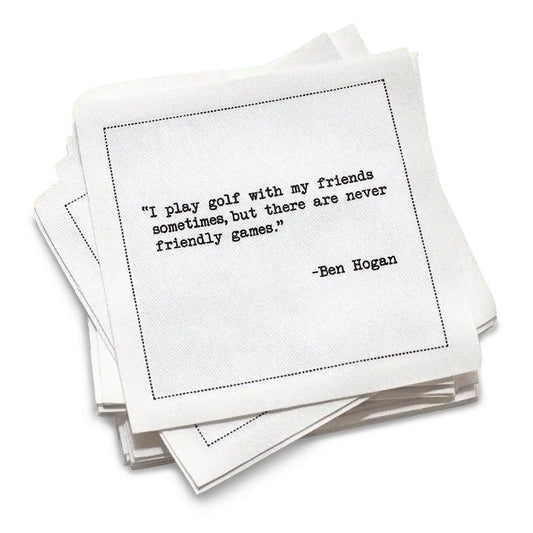 Organic cotton cocktail napkin, white, with black dotted border printed with the Greg Norman quote "Happiness is a long walk with a putter," from Five Star Napkins' Golf Legends quote collection
