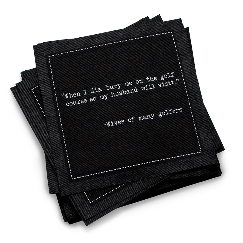 Organic cotton cocktail napkin, black, with white dotted border printed with the quote "When I die, bury me on the golf course so my husband will visit," from Five Star Napkins' Golf Humor quote collection
