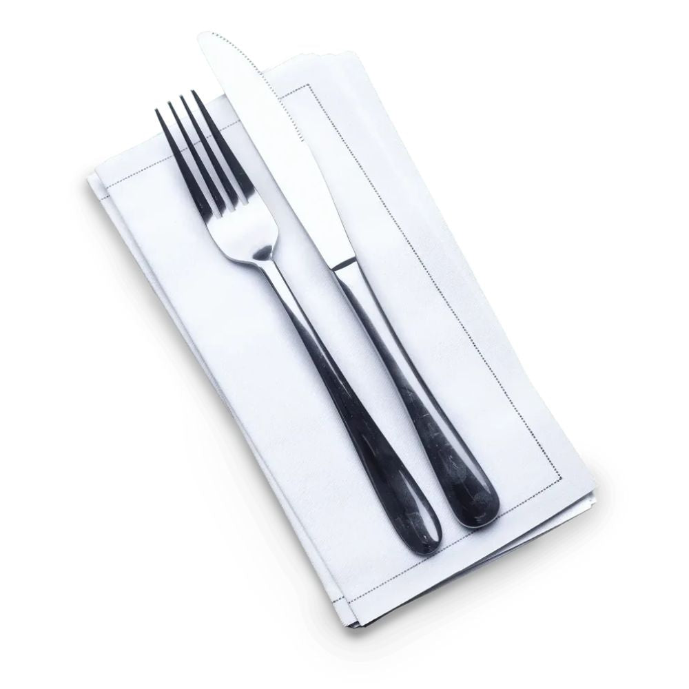 Half-folded white organic cotton cocktail napkin with a fork and knife, by Five Star Napkins.