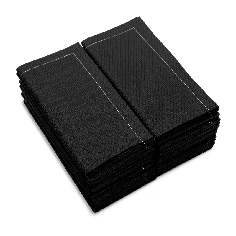 Stack of folded Anthracite Grey organic cotton napkins with textured pattern