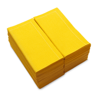 Stack of folded Citron organic cotton hand towels with textured pattern