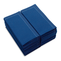 stack of folded Midnight Blue organic cotton hand towels with textured pattern